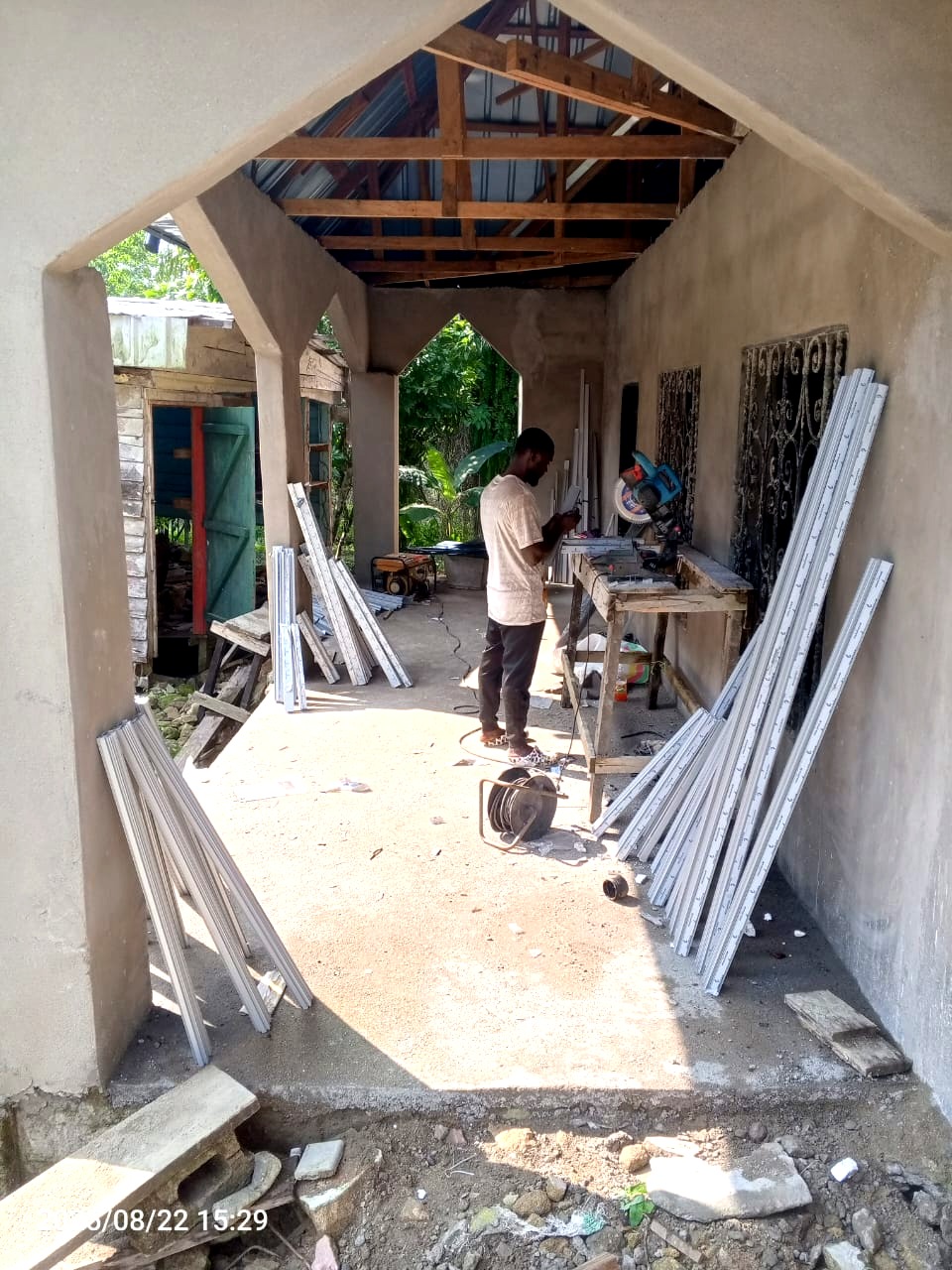 Aluminium profiles and cutting station set up at a NNANG Group project site
