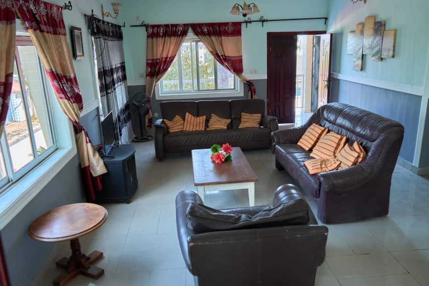 Furnished parlour with sofas at the NNANG Group Guest House in Limbe