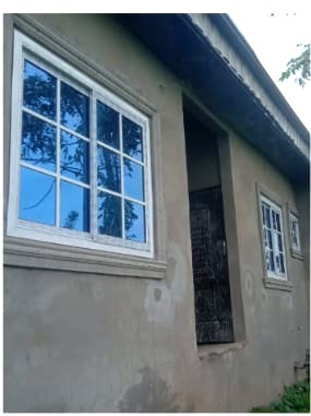 Installed aluminium windows with clear glazing on a finished wall